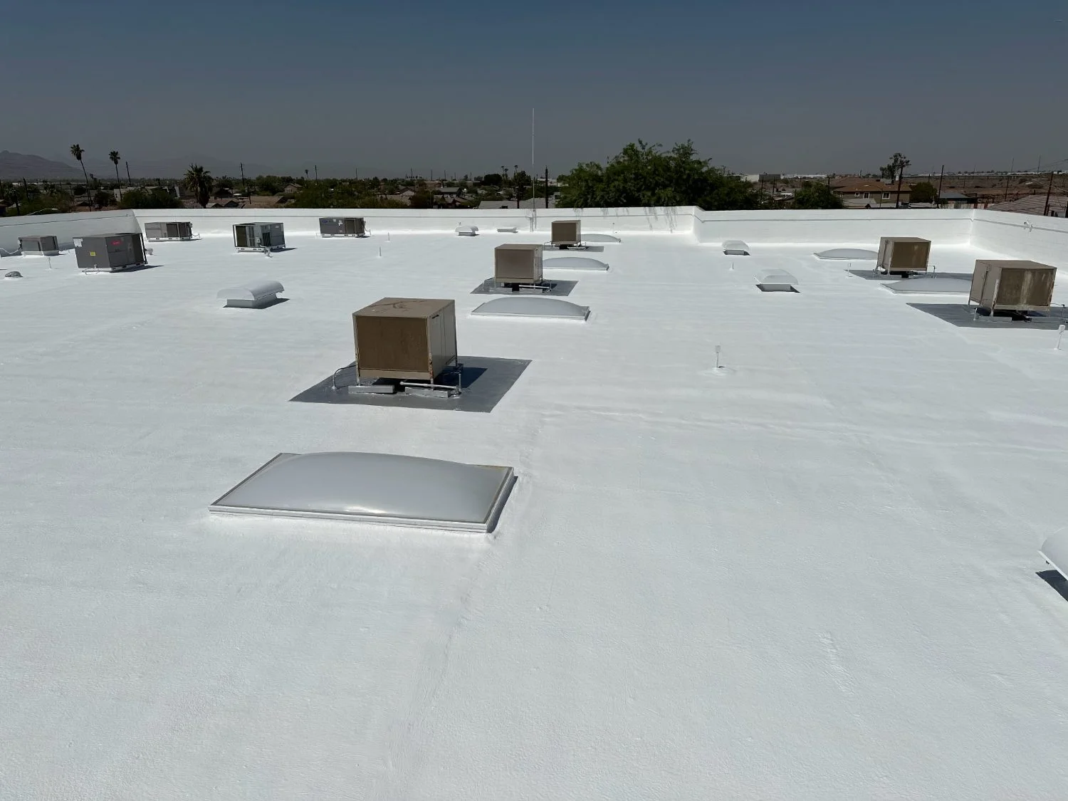Completed flat foam roof on a commercial property