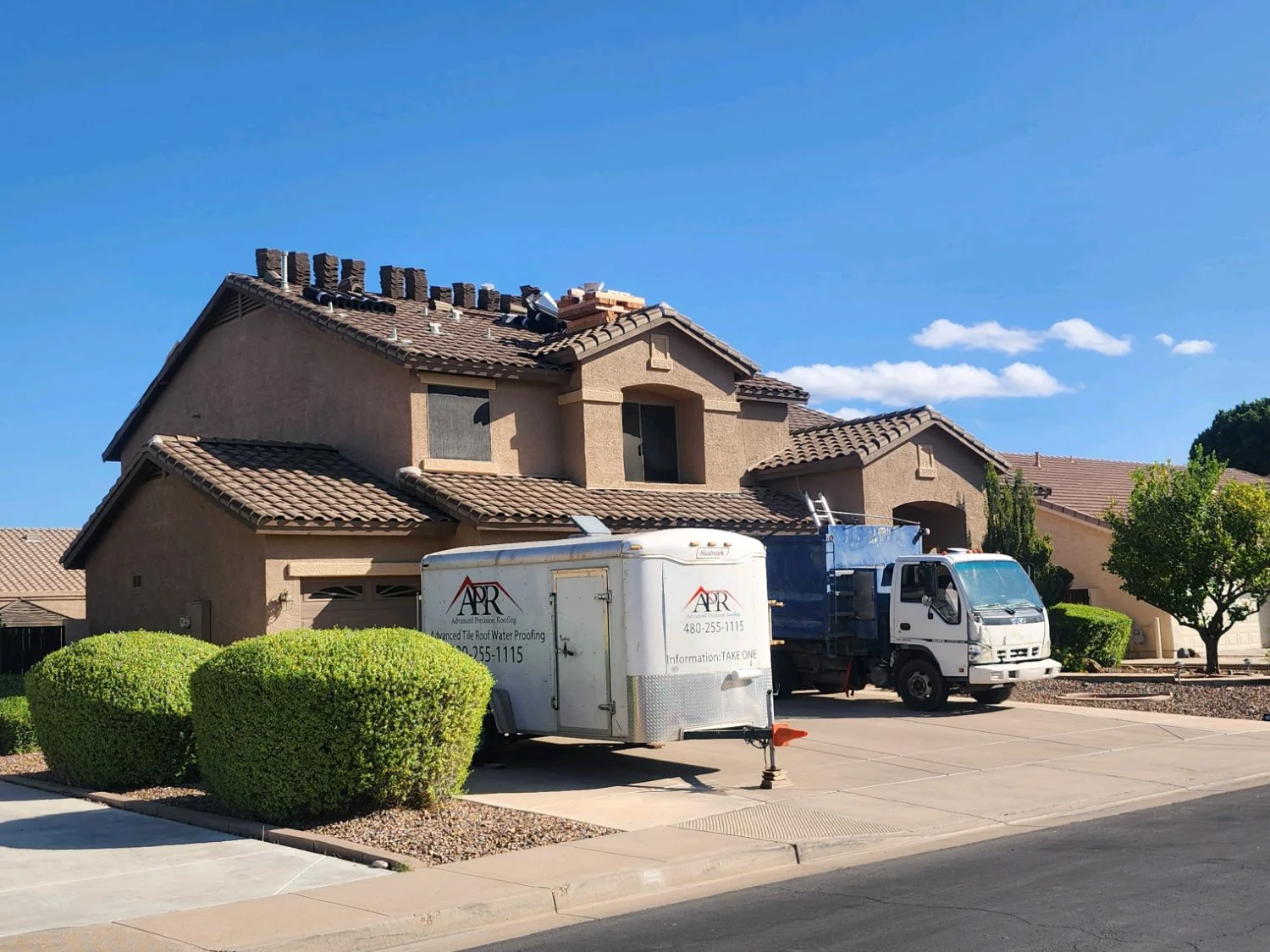 Shingle roof tear-off on a two-story home